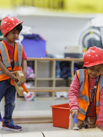 Little boys wearing construction dress