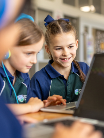 Students working on computer