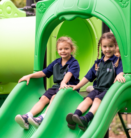 Children playing on slide