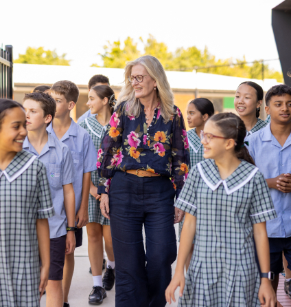 Students walking with school principal